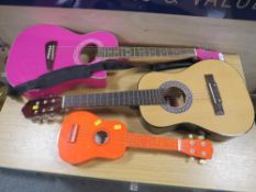 A CHILDS CARLY BY CARLO ROBELLI PINK ACOUSTIC GUITAR TOGETHER WITH A JOSE FERRO EL PREMO CHILDS