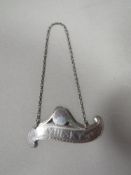 AN ANTIQUE GEORGIAN SILVER WINE LABEL 'WHISKEY' BRITANNIA STANDARD HALLMARKED BIRMINGHAM 1910