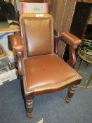 A LATE VICTORIAN BARBERS / DENTISTS CHAIR, with upholstered mahogany frame, with reclining back rest