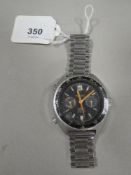 A VINTAGE AUTAVIA HEUER AUTOMATIC CHRONGRAPH WITH TWO SUBSIDIARY DIALS AT 3 AND 9 O'CLOCK DATE