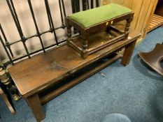 A heavy oak trestle style bench together with an oak stool with a upholstered top