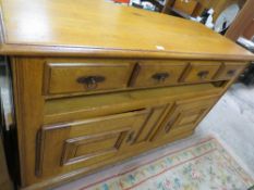 A large and heavy oak serving sideboard W 157 cm