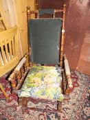 A LATE 19TH /EARLY 20TH CENTURY ROCKING CHAIR