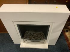 A modern white framed electric fire - House Clearance