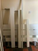 A modern show home white gloss double bed frame