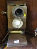 A VINTAGE WALL MOUNTED STICK TELEPHONE