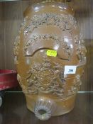 A CERAMIC BARREL WITH ROYAL CREST