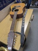 AN AVIA 12 STRING ACOUSTIC GUITAR