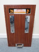 A VINTAGE CARFIELD WALL MOUNTED ARCADE COIN CHANGER MACHINE, wood case with chrome fittings, slots