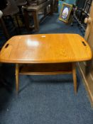 An Ercol style two tier blonde coffee table