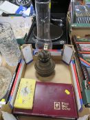 A VINTAGE PARAFFIN LAMP TOGETHER WITH A BOOK OF FIRST DAY COVERS ETC
