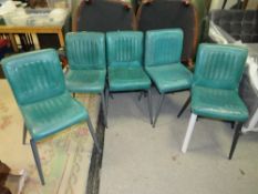 Set of four modern teal leather style dining chairs
