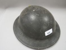 A VINTAGE ARMY TIN HAT