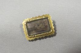 A GEORGIAN MOURNING BROOCH