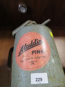 A VINTAGE ALADDIN PINK PREMIUM PARAFFIN CAN
