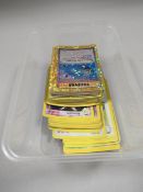 A QUANTITY OF COLLECTABLE POKEMON TRADING CARDS