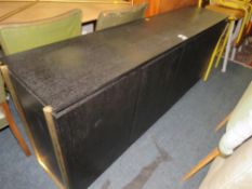 A MODERN BLACK AND METAL SIDEBOARD W- 182CM