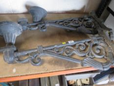 TWO LARGE CAST IRON WALL LIGHTS