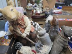 A TRAY OF ASSORTED CERAMIC AND RESIN ANIMAL FIGURES TO INCLUDE A SAUSAGE DOG BOOT SCRAPER