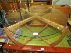 A mid-century teak and glass coffee table Dia. 76 cm