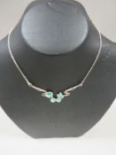 A SILVER RING AND SILVER AND ENAMEL ART NOUVEAU NECKLACE