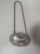 AN ANTIQUE GEORGIAN SILVER WINE LABEL 'WHISKY' BY GEORGE UNITE HALLMARKED BIRM. 1839
