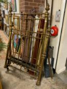 A Victorian three-quarter size heavy brass bedstead with stretchers and irons