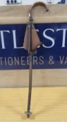 AN ANTIQUE SHOOTING STICK