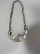 AN ANTIQUE GEORGIAN SILVER WINE LABEL - RUM - HALLMARKED EDINBURGH