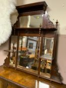 An Edwardian carved mahogany over mantel mirror