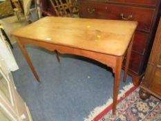 A vintage pine side table on tapered legs W 108 cm