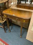 A small walnut console table with single drawer