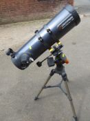 A CELESTRON ASTROMASTER 130 MOTORISED TELESCOPE