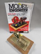 A FLAME / VACUUM ENGINE ON WOODEN PLINTH, with build plans