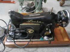 FOUR ASSORTED VINTAGE SEWING MACHINES TO INCLUDE SINGER ETC - A/F TOGETHER WITH TWO OVERLOCK STYLE