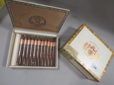 A CASE OF LA CORNA CIGARS TOGETHER WITH AN EMPTY PUNCH CIGARS BOX