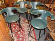 Two pairs of green leather bar/kitchen stools