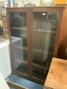 An early 20th century mahogany two door bookcase W 94 cm