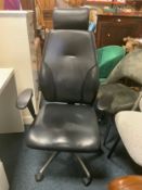 A modern swivel office armchair A/F