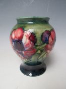 A MOORCROFT ANEMONE PATTERN BALUSTER VASE, H 14.5 cm