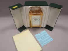 A CASED DAVID PETERSON CARRIAGE CLOCK