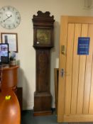 Antique oak, cased brass face long case clock by T Bradford of Buckingham H 211 cm Face Dia. 11”