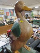 A 20TH CENTURY WOODEN DUCK