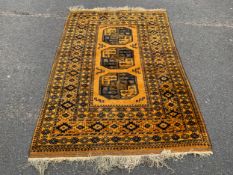 An Eastern woollen rug