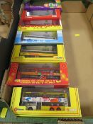 Seven boxed Corgi Chinese double decker buses