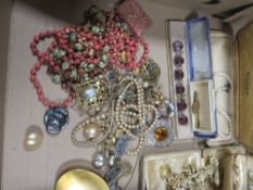 A quantity of vintage costume jewellery to include Trifari necklace and earring set etc