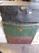 Three vintage steel travel trunks