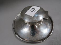 A large style antique capstan inkwell