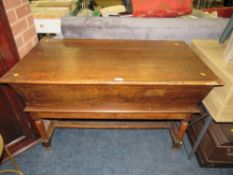 An antique dough trough/bin on wooden stand