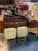 Two retro kitchen, stools, two leather style suitcase's and a singer sewing machine